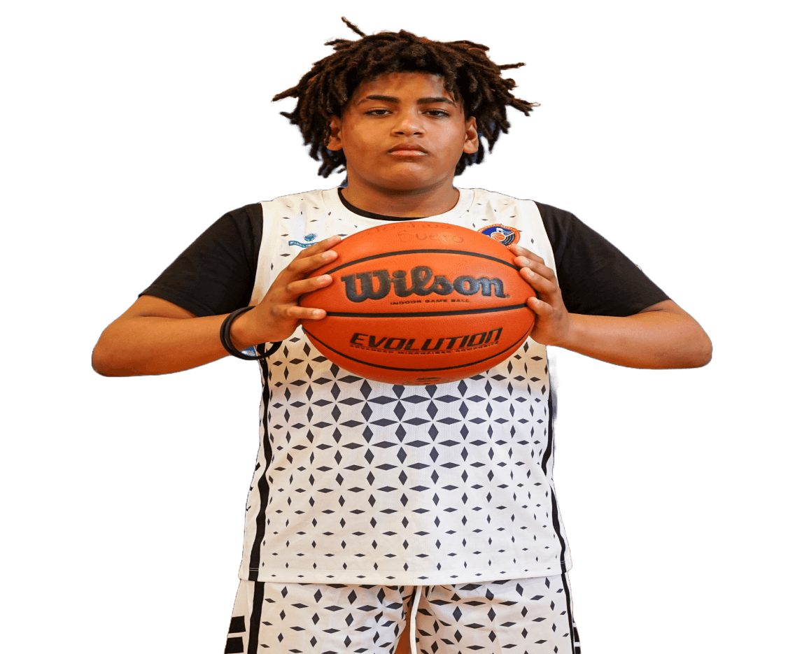 Boy player holding a basketball